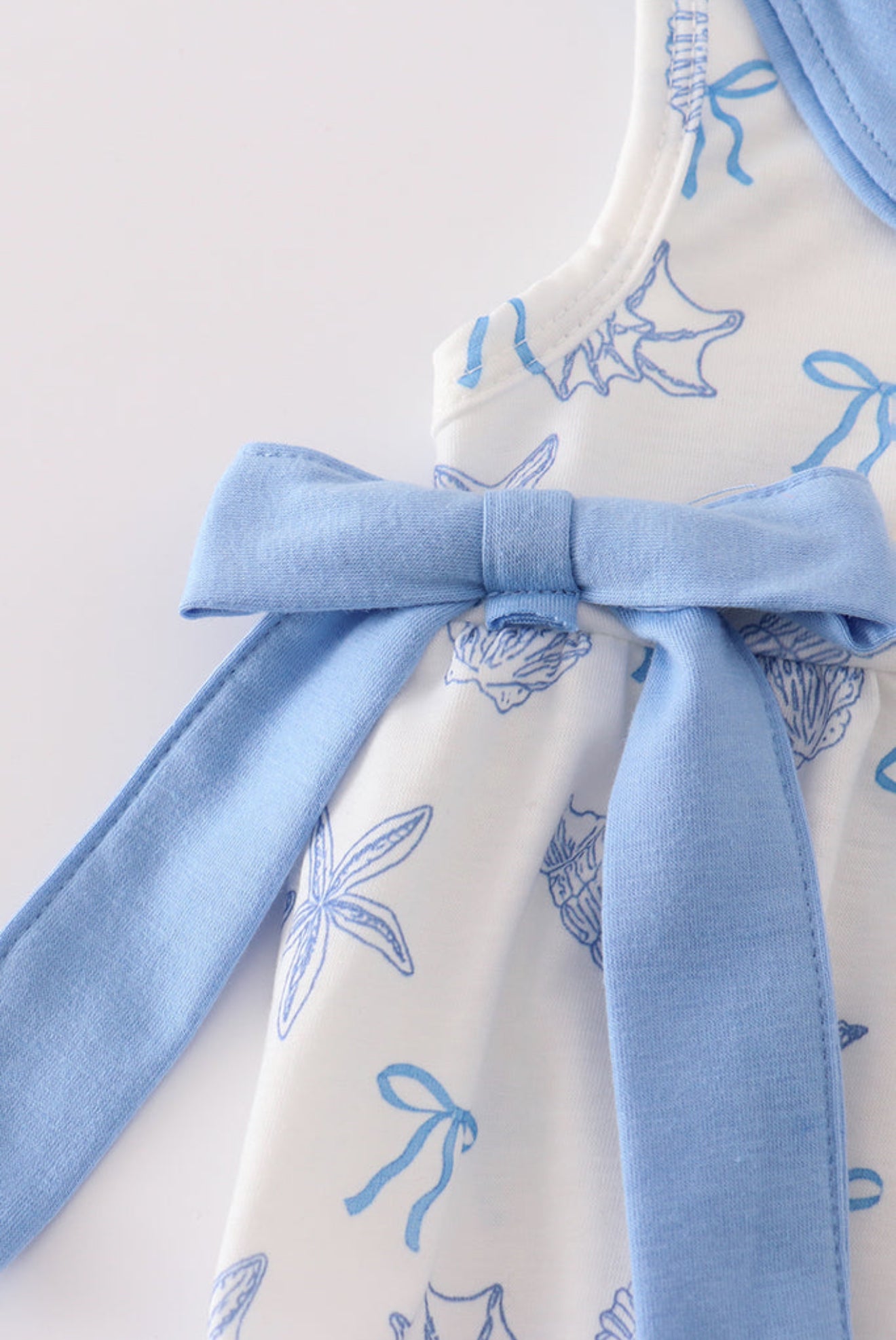 BLUE SEASHELL BOW BUBBLE