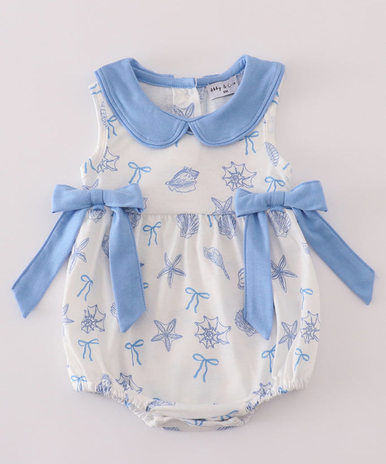 BLUE SEASHELL BOW BUBBLE