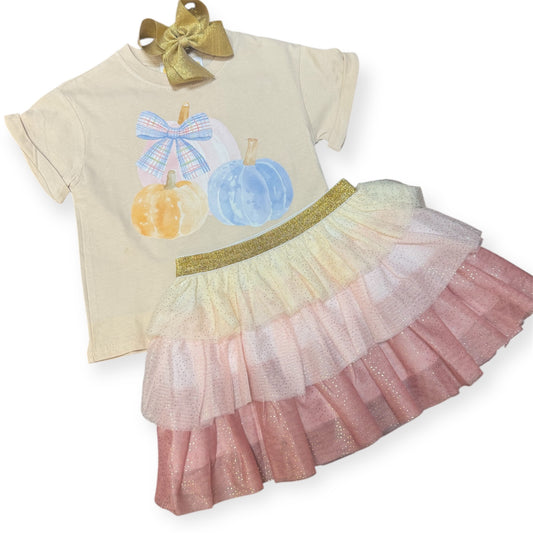 Three pumpkins on tan